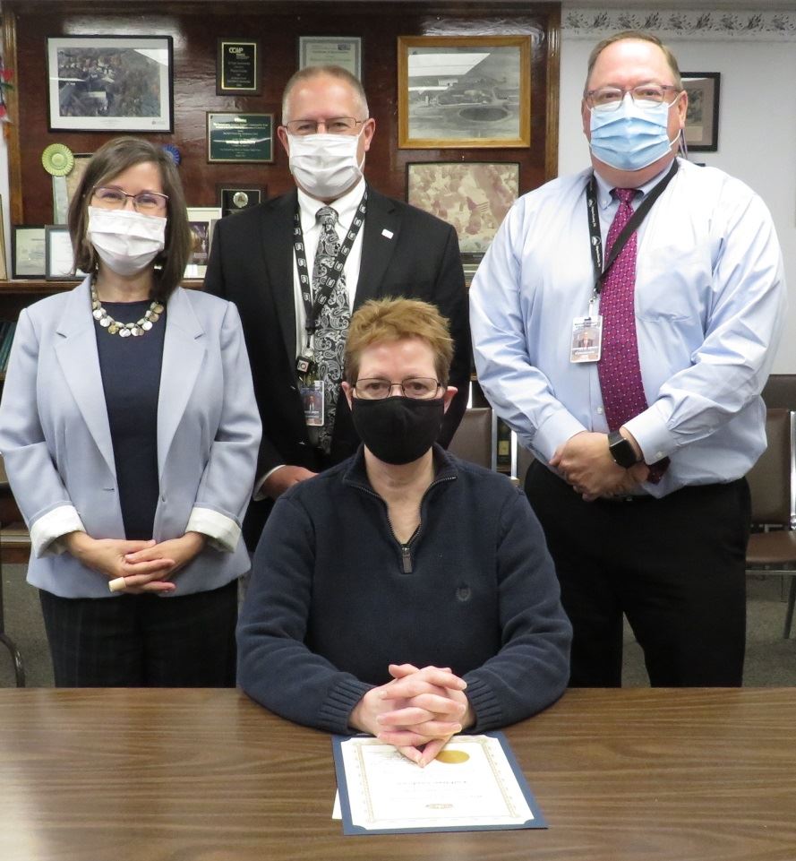 Kathleen VanHorn  with the Commissioners marking one year of service to the people of Wayne County.