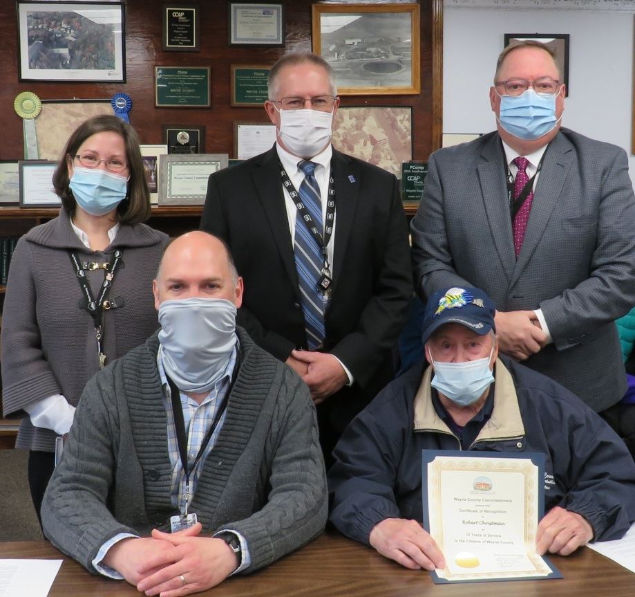 Robert Christman  with the Commissioners marking ten years of service to the people of Wayne County.