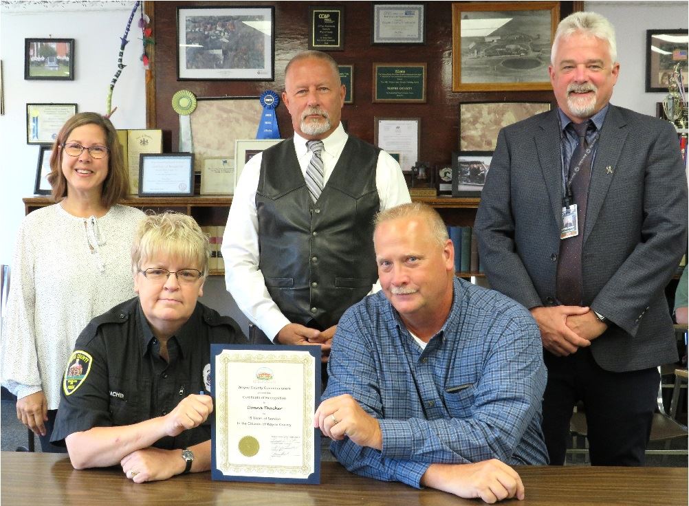 Donna Thacher, Corrections, 15 years